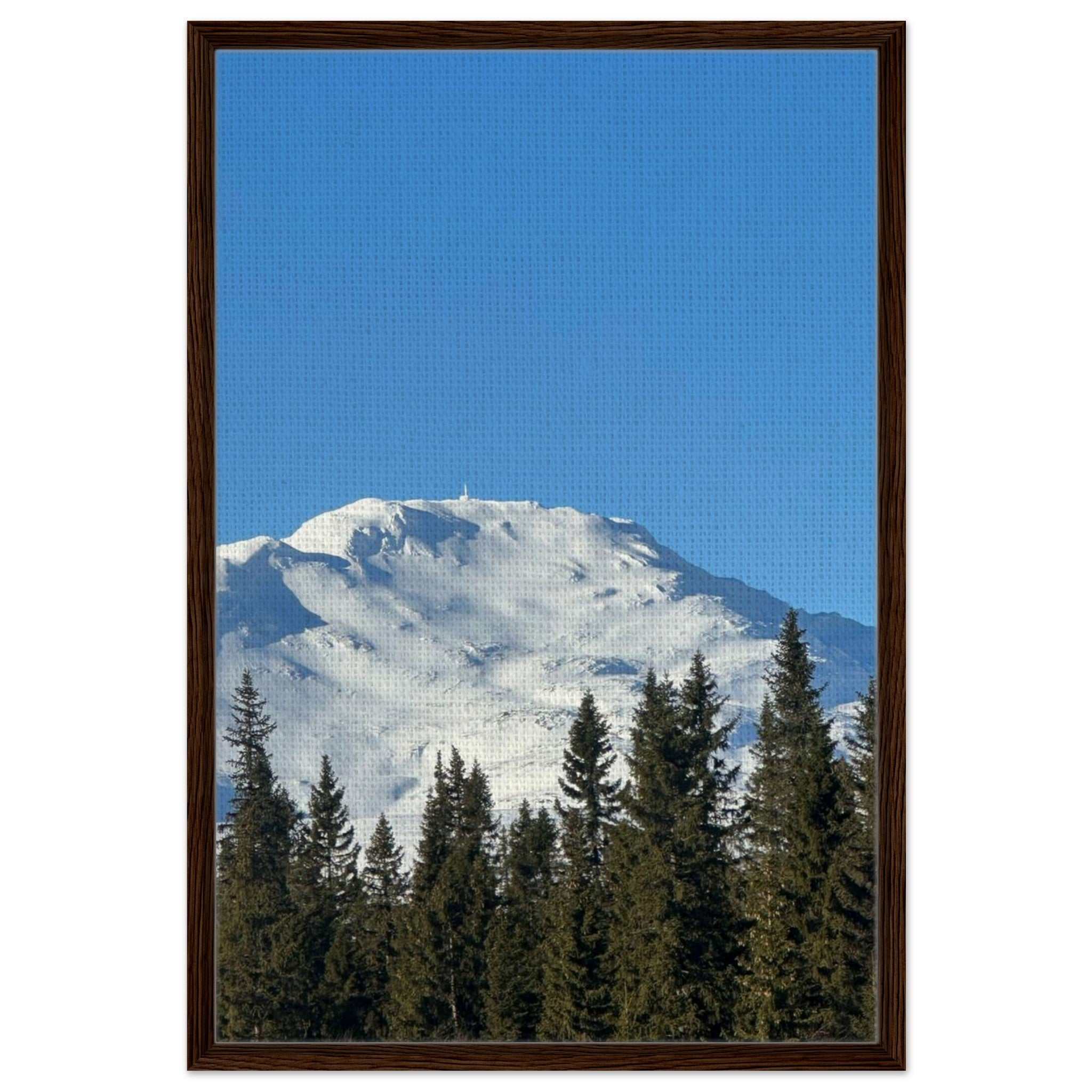 Framed canvas print of snow-covered Åreskutan mountain in Jämtland, Sweden with forest foreground and clear blue sky