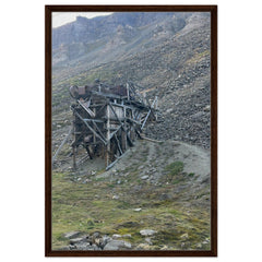 Framed canvas print of old coal mine structure on rocky hillside in Svalbard
