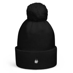 Black Pom Pom Beanie with soft acrylic knit and playful pom pom on top for cozy fall style
